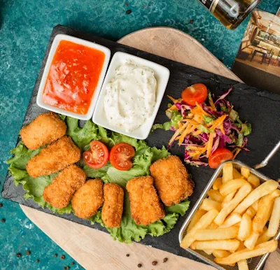 rico pescado frito con papas
