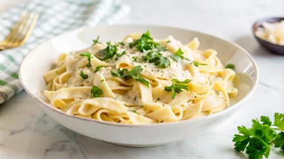 Delicioso Fettuccine con Salsa Alfredo